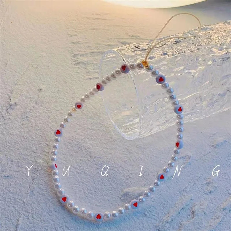 New Ins Trendy Red Love Heart Pearl Chain Mobile Phone Chains Anti-Lost Handmade Acrylic Charm Cord Lanyard for Women Girls
